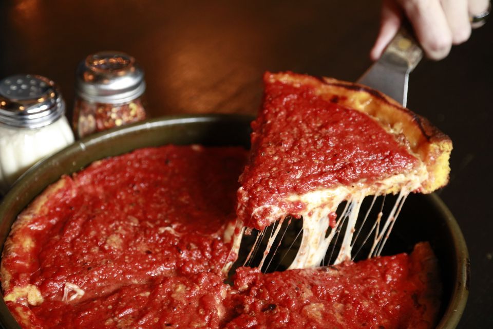 Chicago: Downtown Pizza Guided Walking Tour with Tastings - Starting near Navy Pier: your first slice at Robert’s Pizza