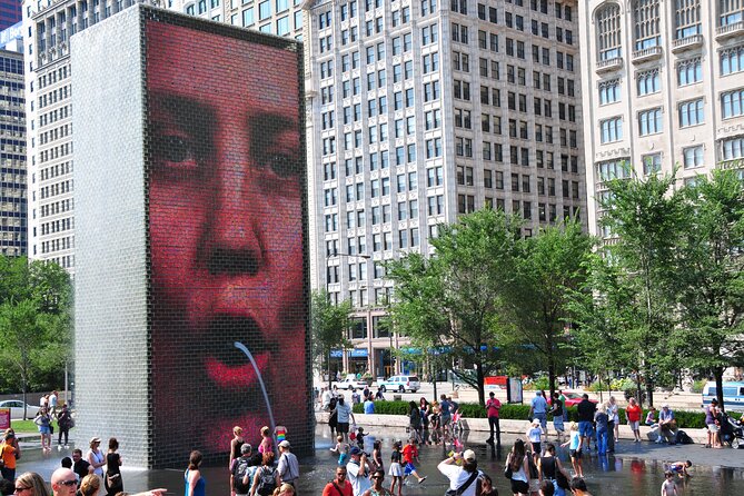 Chicago Food Tour with The Magnificent Mile and Millennium Park - Wrigley Building clocks, public art, and Chicago Theatre glamour