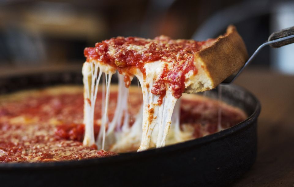 Chicago: Guided Holiday Walking Tour and Food Sampling - Deep-dish pizza and hot dogs: Chicago classics, not tourist knockoffs
